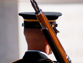 Rear view of man playing guitar