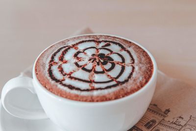 Close-up of cappuccino on table