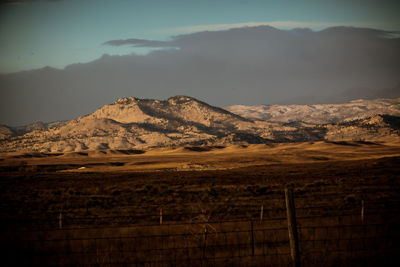 Scenic view of desert against sky