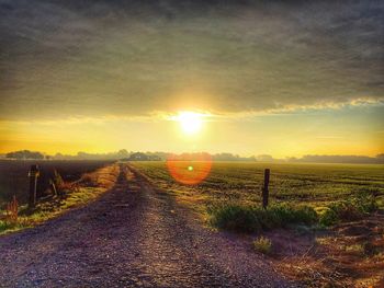 Road passing through field