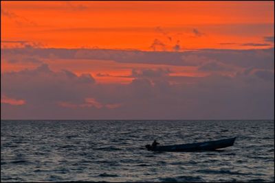 Scenic view of sea at sunset