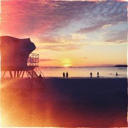 Scenic view of sea at sunset