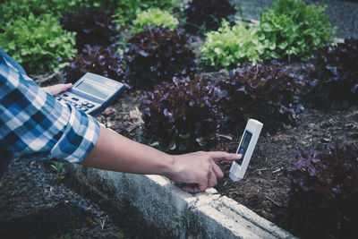 High angle view of man using mobile phone