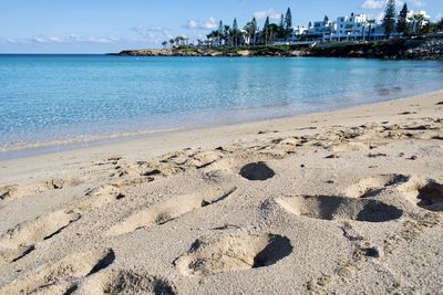 Scenic view of beach against sky