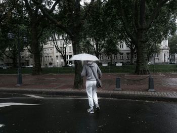 Man walking on road