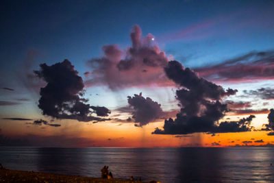 Scenic view of sea against sky at sunset