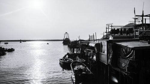 Ship at harbor against clear sky