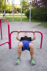 Man exercising in park