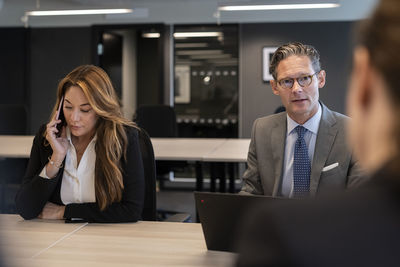 Business people having meeting in office