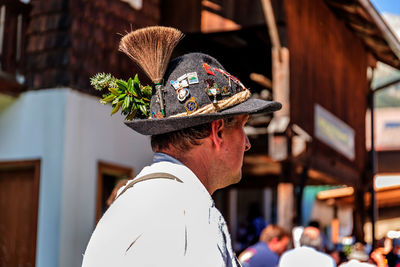 Rear view of man wearing hat outdoors