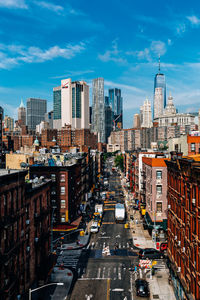 High angle view of street amidst buildings in city