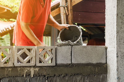 Motion blur bricklayer man working build for construction at home