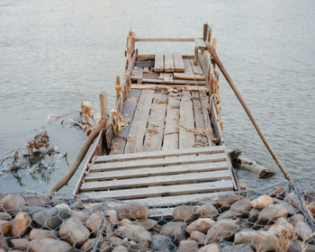 High angle view of wooden pier over sea