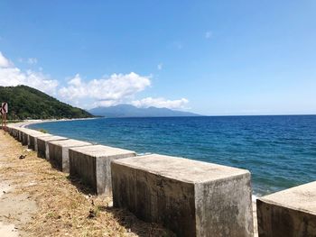 Scenic view of sea against blue sky