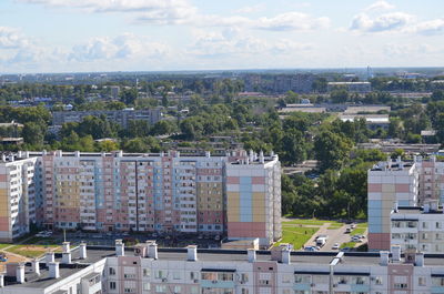 High angle view of buildings in city against sky