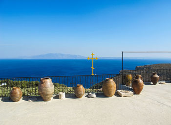 Panoramic view of sea against clear blue sky