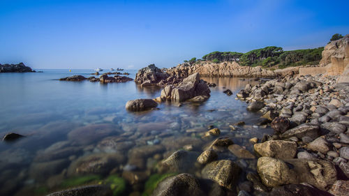 Scenic view of sea against clear sky