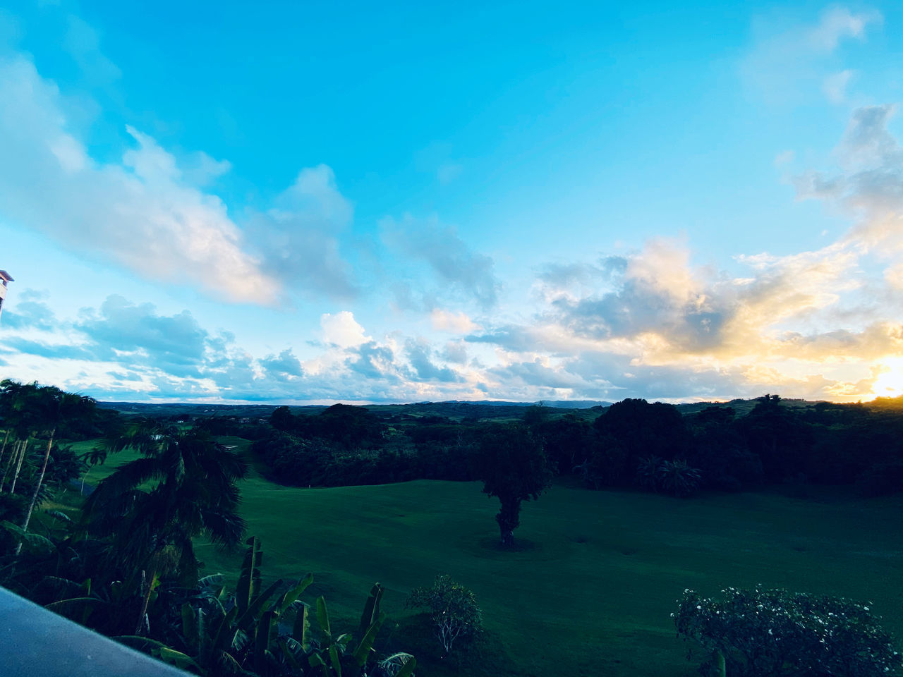 SCENIC VIEW OF LAND AGAINST BLUE SKY