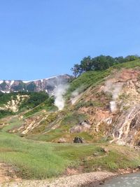 Scenic view of mountains against clear sky