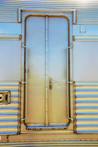 Closed metallic door of train