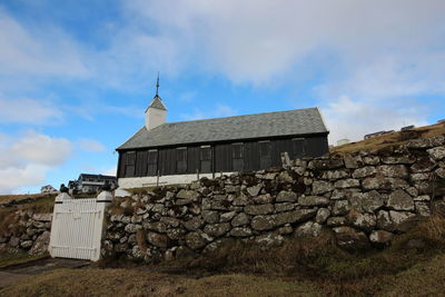 Exterior of historic building against sky