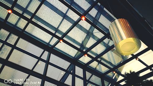 Low angle view of illuminated ceiling