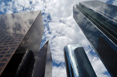 Low angle view of modern buildings against sky