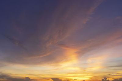 Low angle view of dramatic sky during sunset