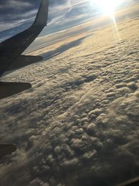 Aerial view of landscape against sky during sunset