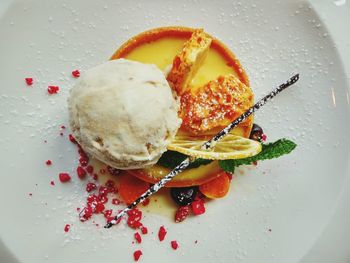 High angle view of dessert in glass plate