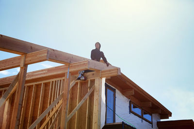 Low angle view of architecture building house against clear sky during sunny day