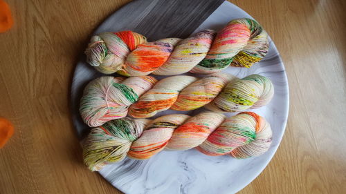 High angle view of yarn in plate on table