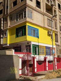 Yellow building against sky