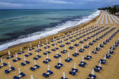 High angle view of sea shore against sky