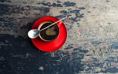 High angle view of red wine on table