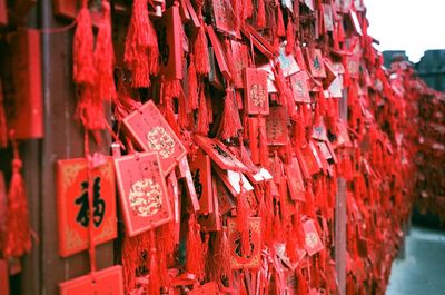 Close-up of text hanging at temple