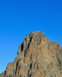 Mountain peak against a blue sky, batian peak in  mount kenya national park, kenya