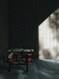 Empty chairs in sunlight