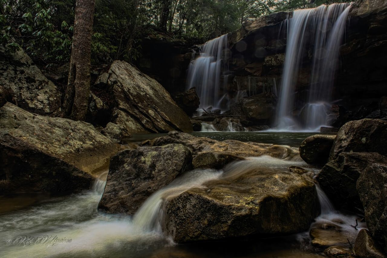 waterfall, motion, long exposure, flowing water, water, flowing, rock - object, beauty in nature, scenics, blurred motion, nature, forest, power in nature, rock formation, splashing, rock, environment, surf, idyllic, tree