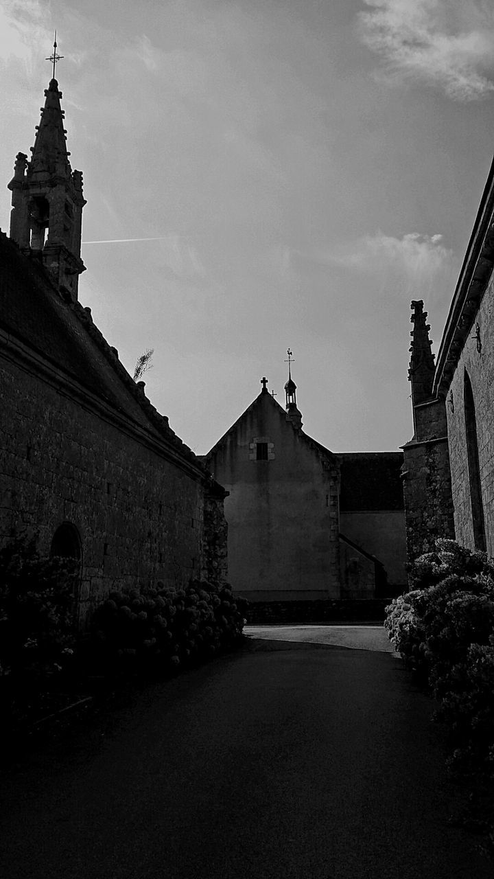 architecture, building exterior, built structure, religion, place of worship, spirituality, church, low angle view, sky, history, cathedral, cross, temple - building, famous place, day, travel destinations, steps, outdoors