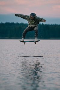 Man jumping in water