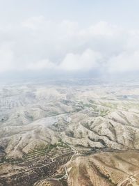High angle view of landscape against cloudy sky