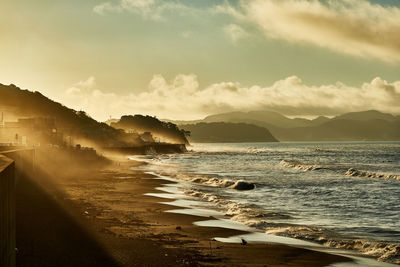 Scenic view of sea against sky during sunrise