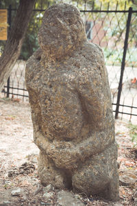 Close-up of statue in cemetery