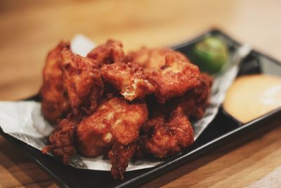 Close-up of meat in plate on table