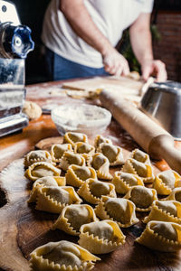 Midsection of man preparing food