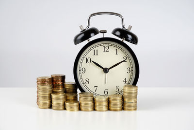 Clock tower against white background