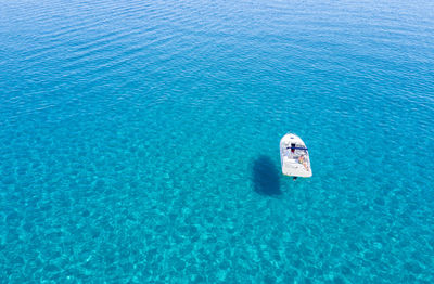 High angle view of woman in motorboat