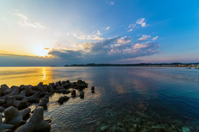 Scenic view of sea against sky during sunset