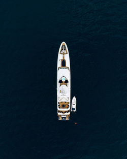 High angle view of boat sailing in sea